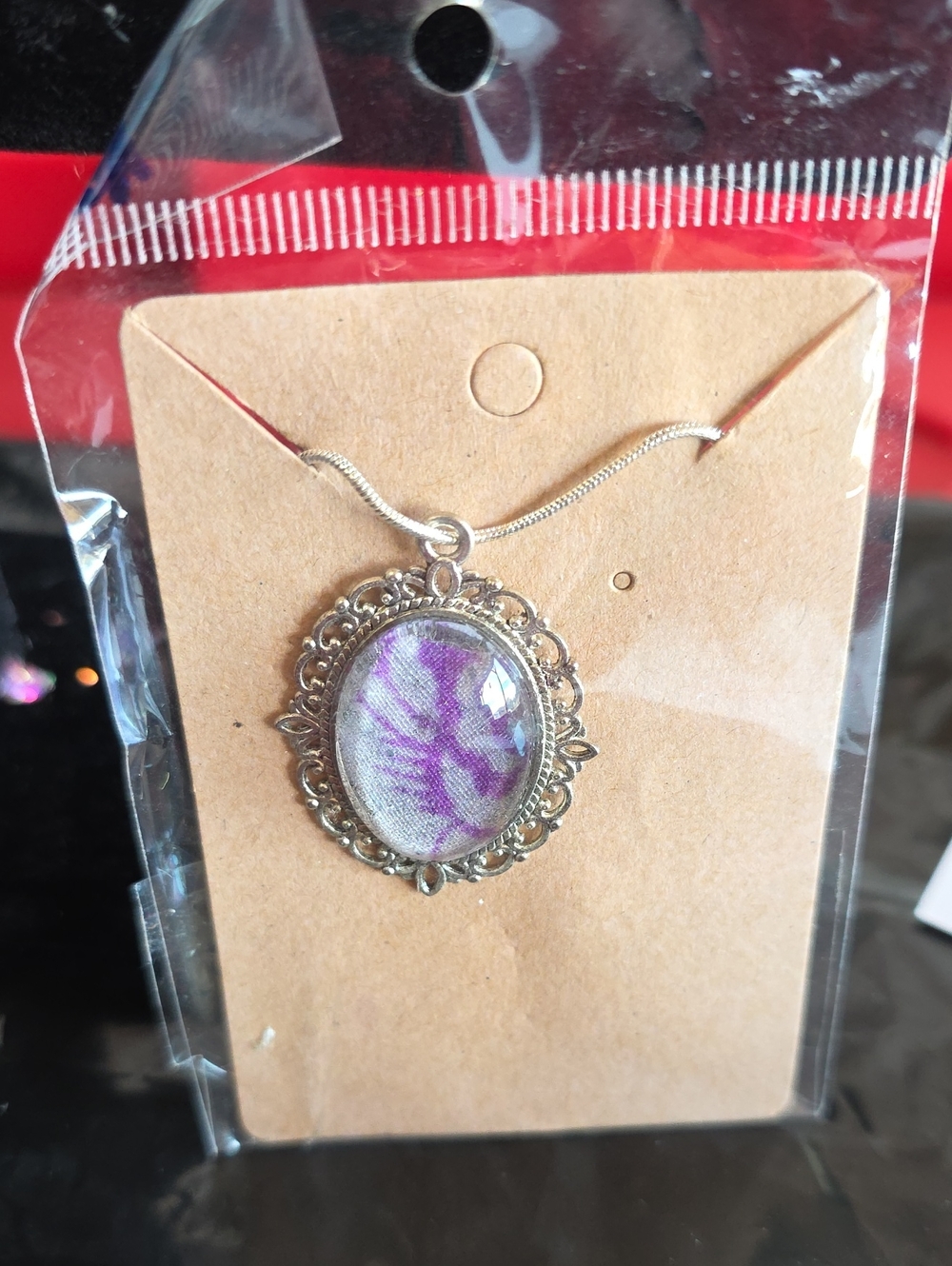 Silver Filigree Pendant Necklace with Purple Stone